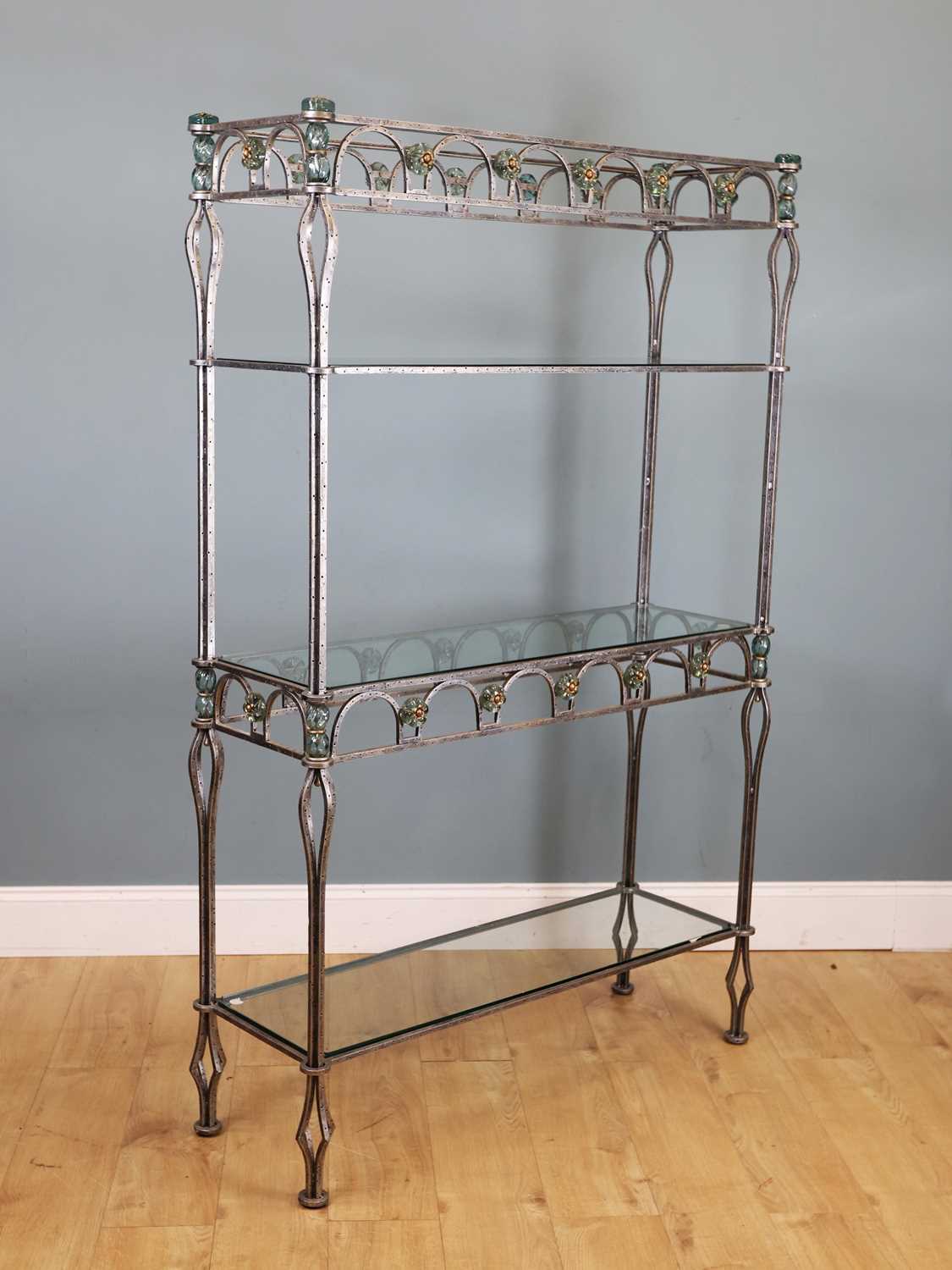 Lot 230 - A set of wrought iron and glass display