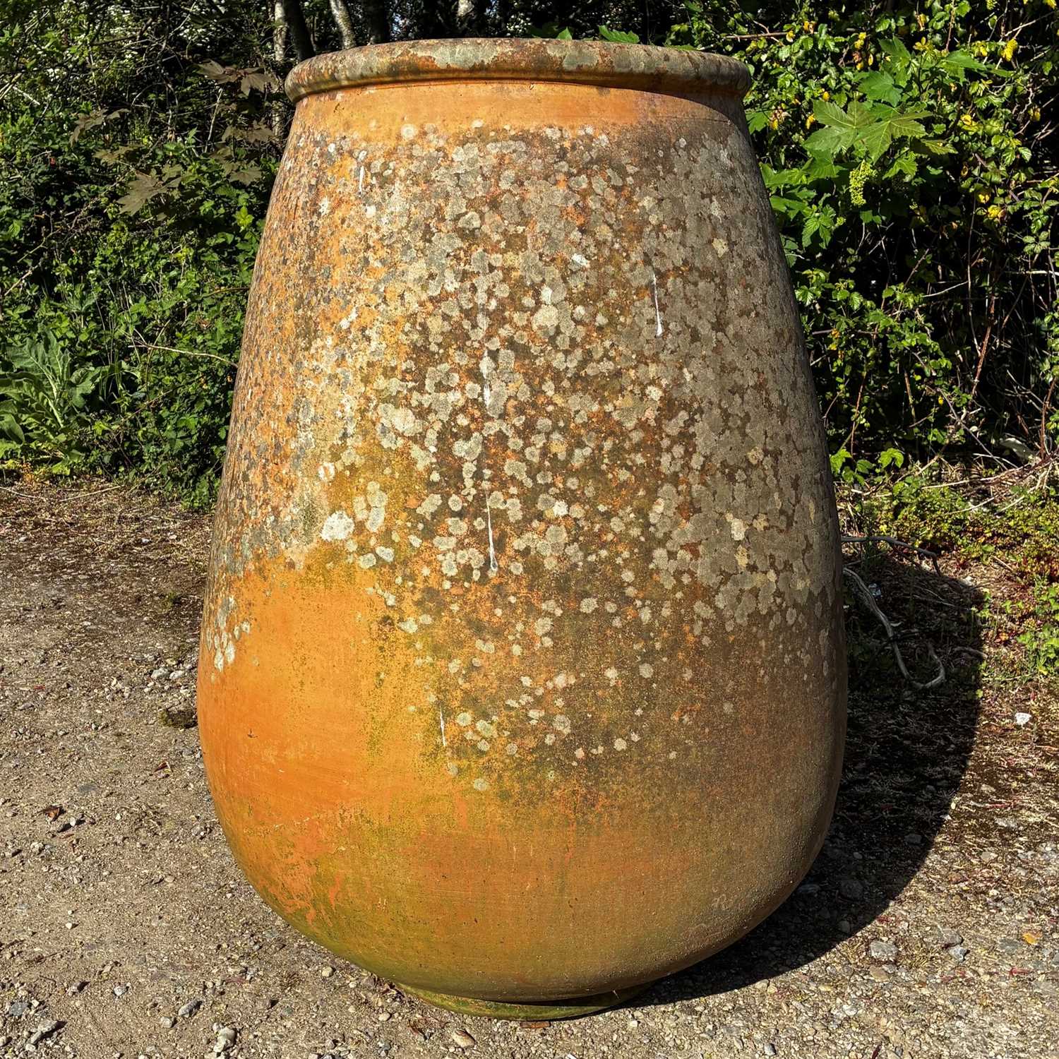 Lot 1363 - A large ovoid terracotta jar or planter