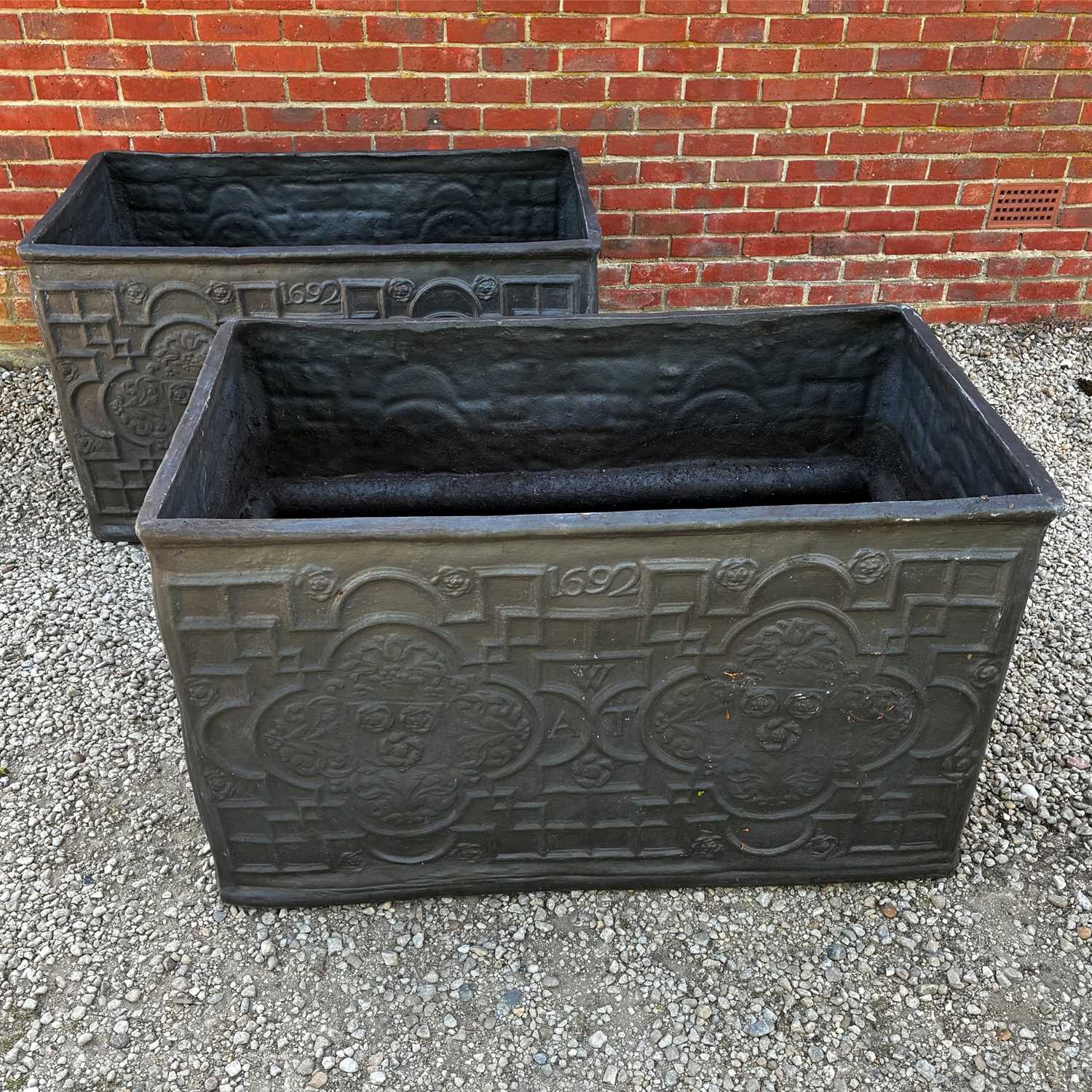 Lot 1350 - A pair of large faux lead rectangular