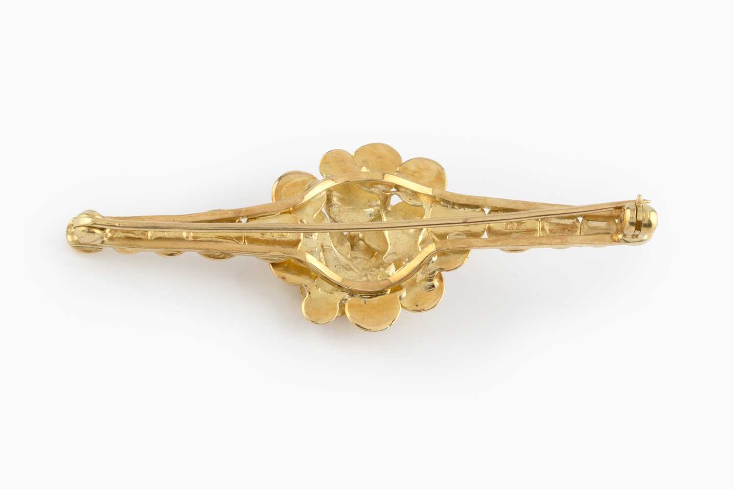 Lot 19 - A diamond set bar brooch by D A Soley, the